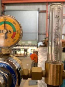 Flow meter connected to regulator