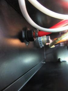 Gas connection inside back of wire feeder